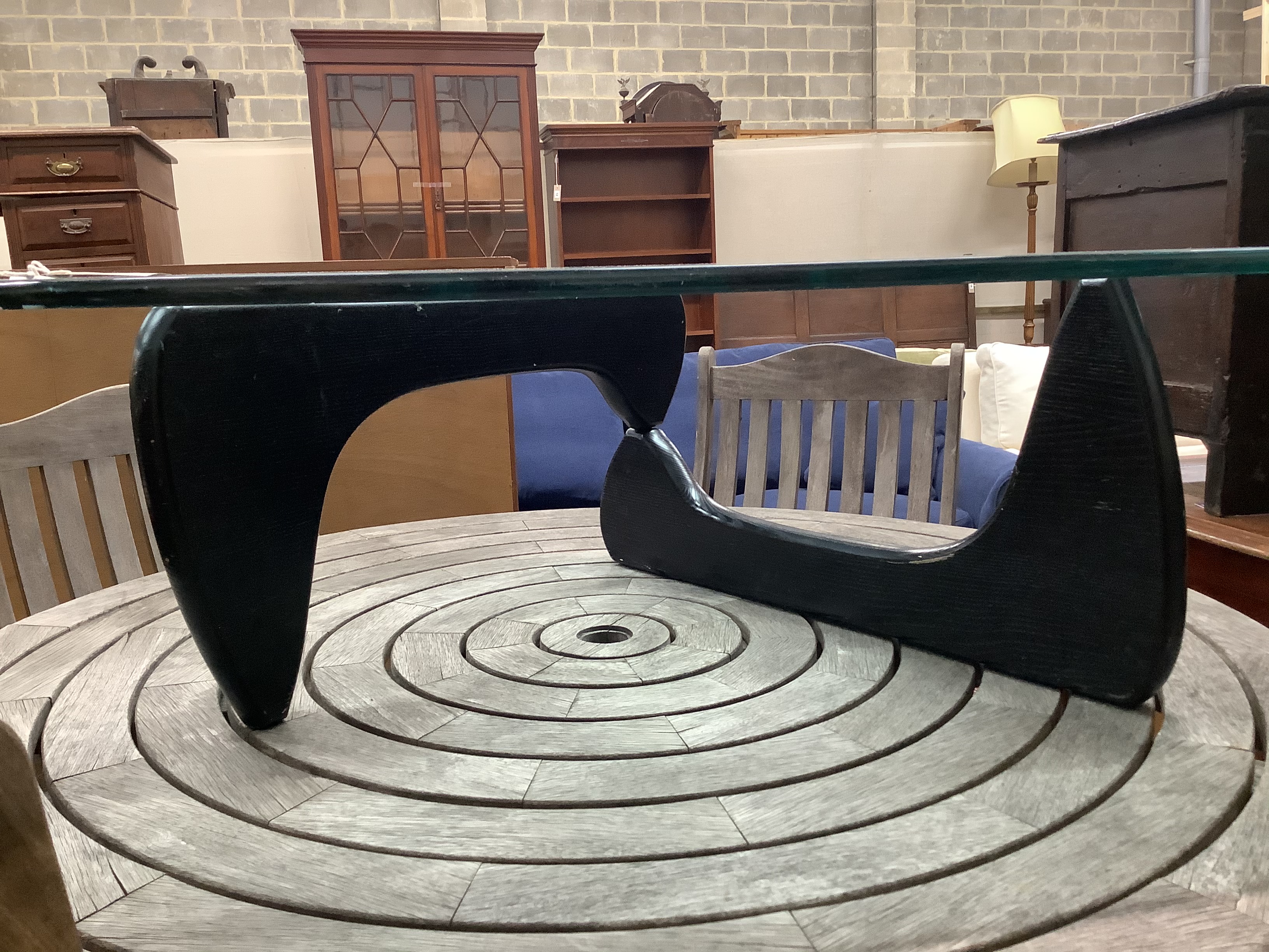 A Isamu Noguchi style coffee table, approximately W 90cm L 124cm